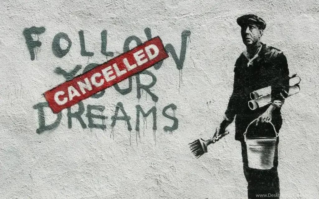 Mural reading “Follow Your Dreams – CANCELLED” painted over with a red stamp.