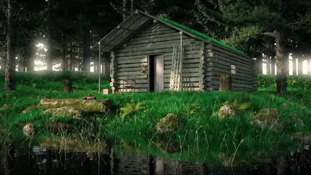 Wooden cabin surrounded by lush forest and reflected in a calm pond