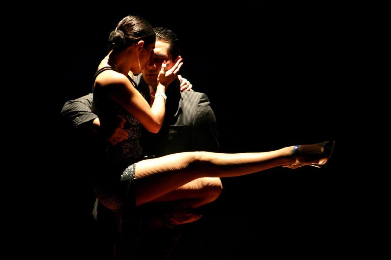 Couple dancing tango, lost in an intimate and passionate moment